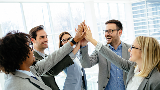 A team high fiving