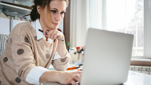 A woman on a laptop